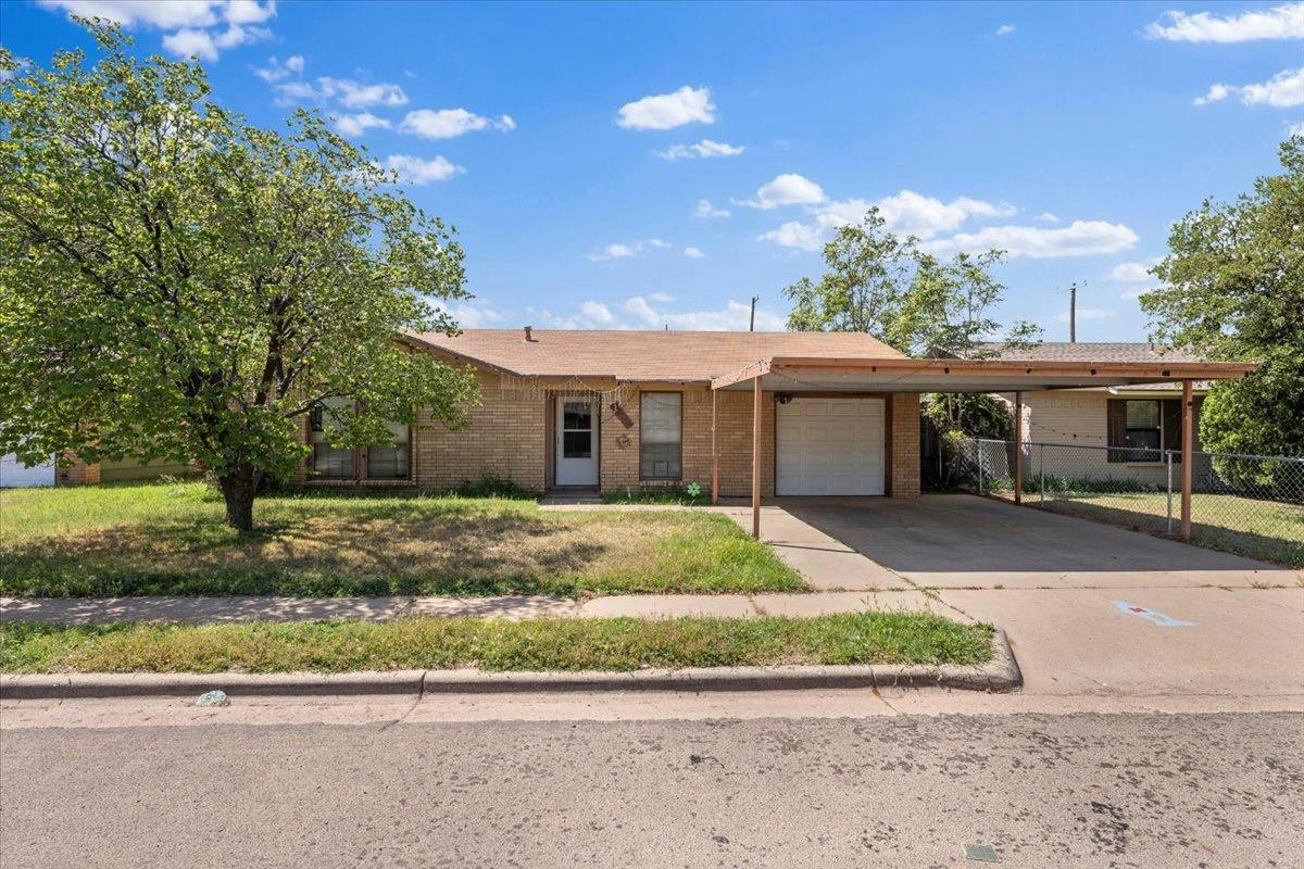 1913 74TH ST, LUBBOCK, TX 79423, photo 1 of 7